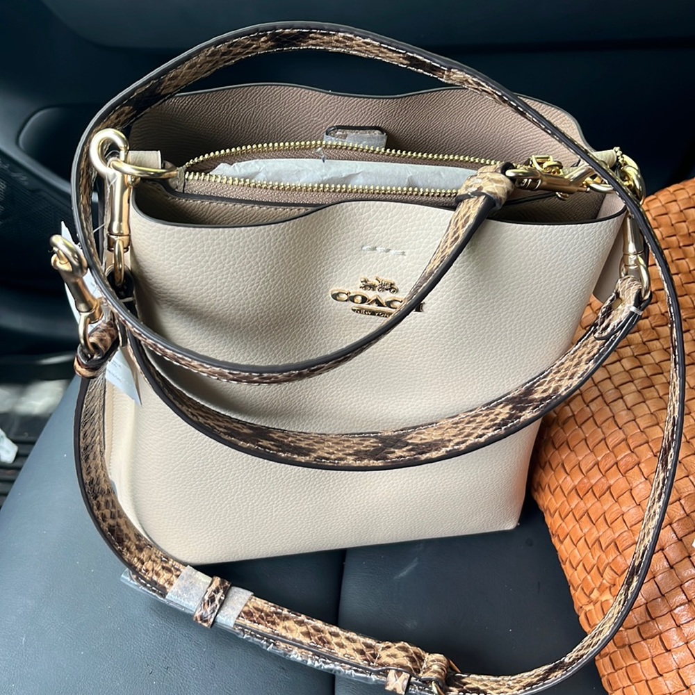 Brand New Coach purse with tag. 2 removable straps.